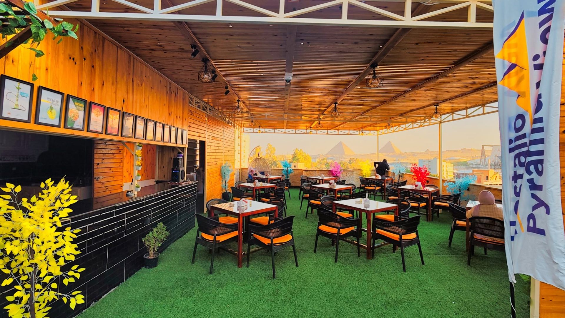 Interior bar and seating area of the Grand View rooftop cafe